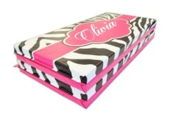 AK Athletic Equipment Zebra Print Monogram 4' X 8' Folding Gymnastics Mat -Exercise Mat zebra folded with drop shadow pink